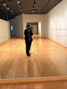 standing in a mirror